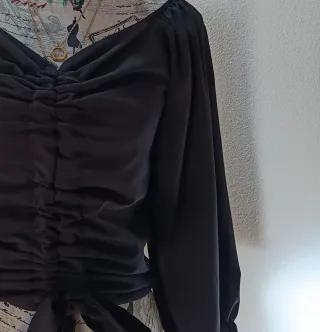 Blusa negra fruncida manga 3/4