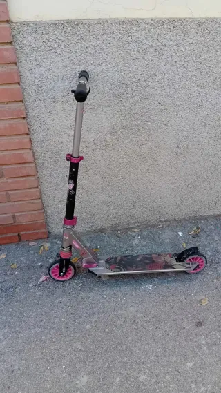 Patinete Oxelo rosa y negro