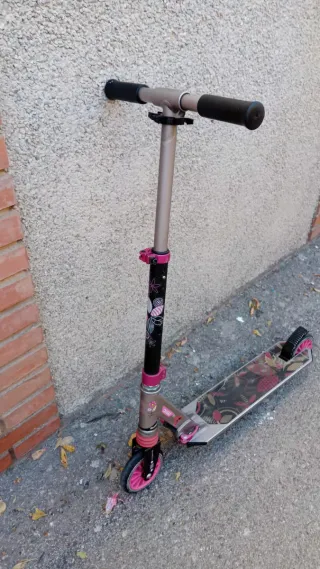Patinete Oxelo rosa y negro