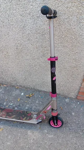 Patinete Oxelo rosa y negro