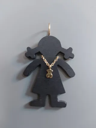 Colgante Tous en madera y oro de 18 ct