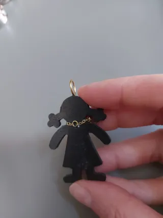 Colgante Tous en madera y oro de 18 ct