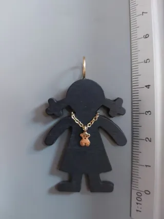 Colgante Tous en madera y oro de 18 ct