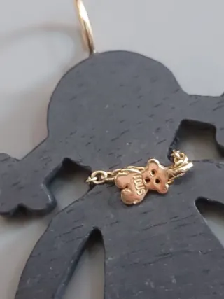 Colgante Tous en madera y oro de 18 ct
