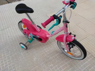 Bicicleta infantil rosa con ruedines NUEVA 140€