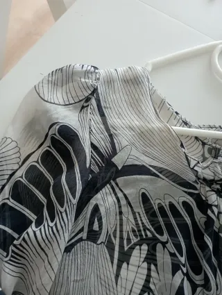 Blusa de seda estampada