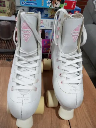Patines Oxelo blancos y rosas