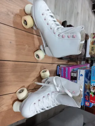 Patines Oxelo blancos y rosas