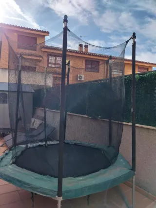 Saltador con red de seguridad