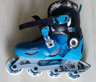 Patines ajustables T32-34 + Casco Azul y funda.
