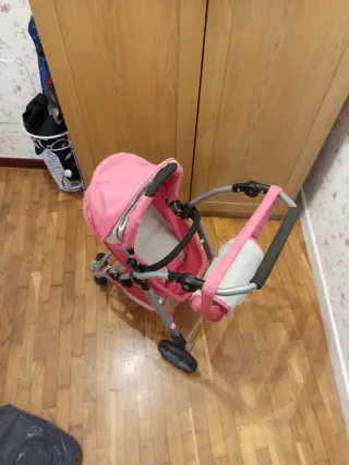 Carrito de muñecas rosa