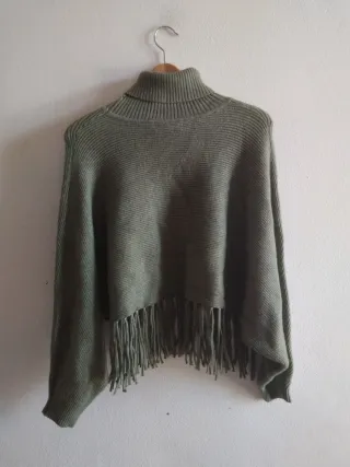 Maglione collo alto con frange