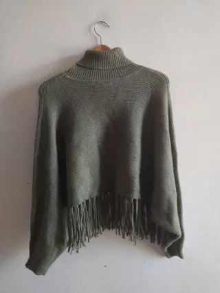 Maglione collo alto con frange