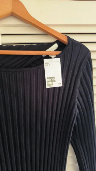 Jersey canalé negro espalda escotada H&M