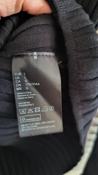Jersey canalé negro espalda escotada H&M