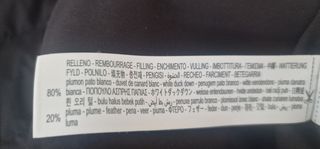 Chaleco plumas negro mujer Oysho