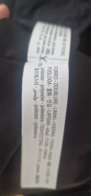 Chaleco plumas negro mujer Oysho