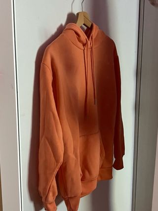 Sudadera con capucha naranja pastel