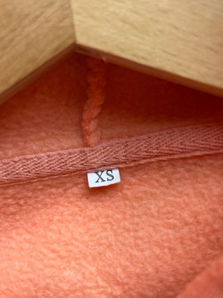 Sudadera con capucha naranja pastel