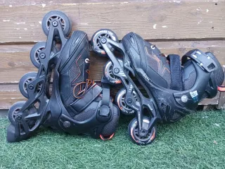 Patines en línea infantiles negros naranjas ABEC 3