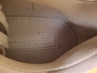 Zapatillas blancas con estrellas