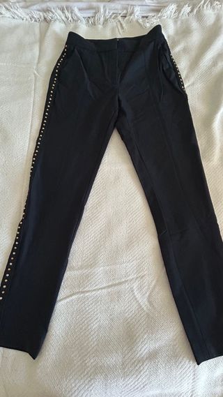 Pantalón Uterqüe negro pedrería lateral T.XS