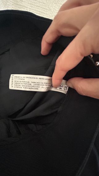 Pantalón Uterqüe negro pedrería lateral T.XS