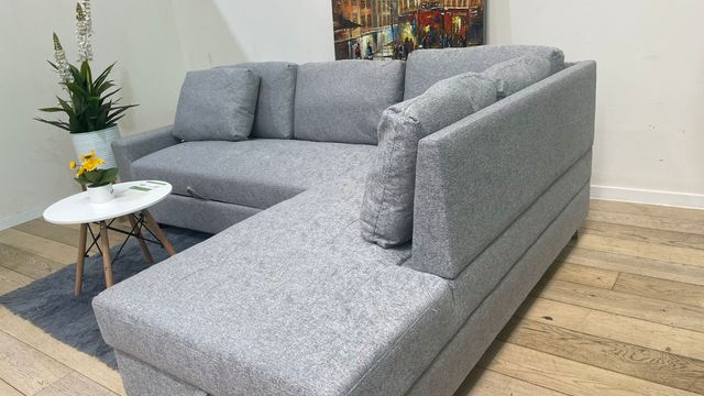 Elegante sofa rinconera con arcon y cama