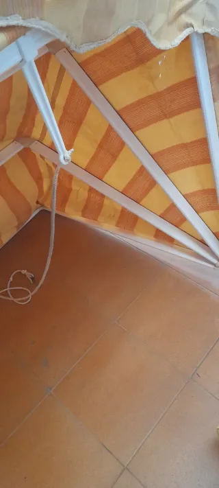 Toldo para ventana rayas naranjas