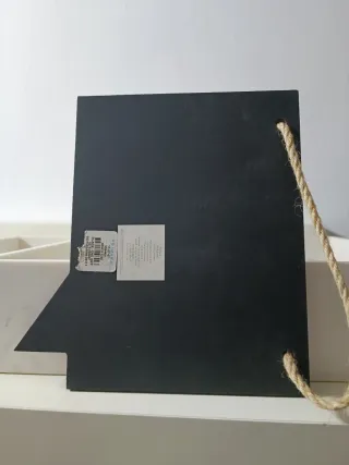 Pizarra negra con cuerda