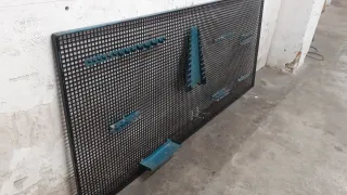 Panel de rejilla con ganchos