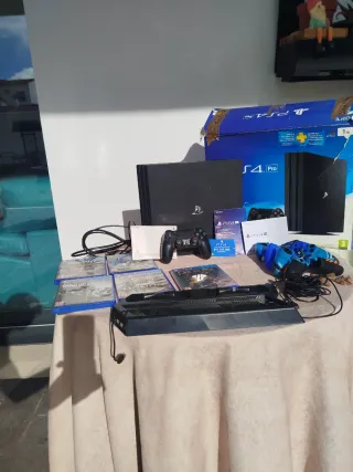 Consola PS4 Pro Nera + Giochi e Accessori