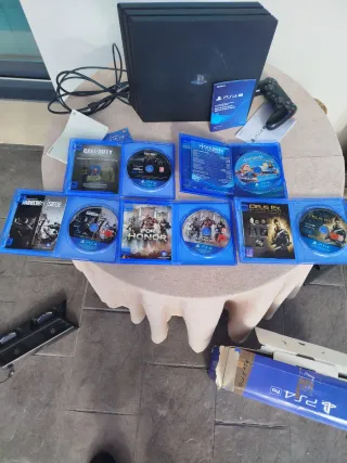 Consola PS4 Pro Nera + Giochi e Accessori