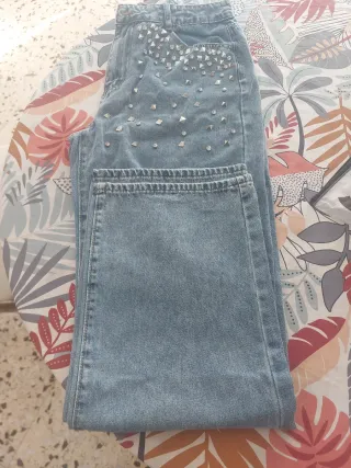Pantalón vaquero plateado tachuelas
