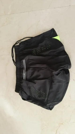 Calzonas running negras con malla interior