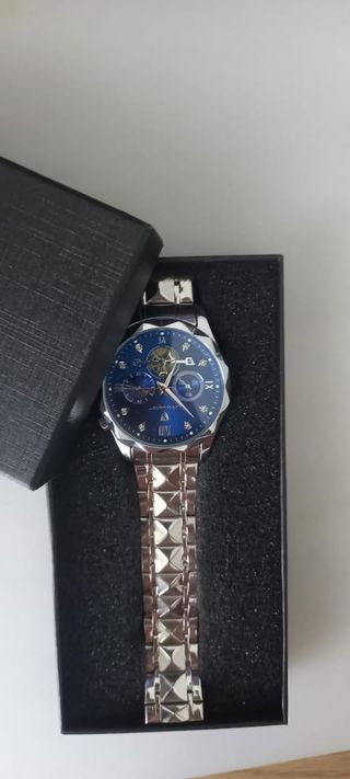 Reloj Poedagar Azul y Plateado Nuevo