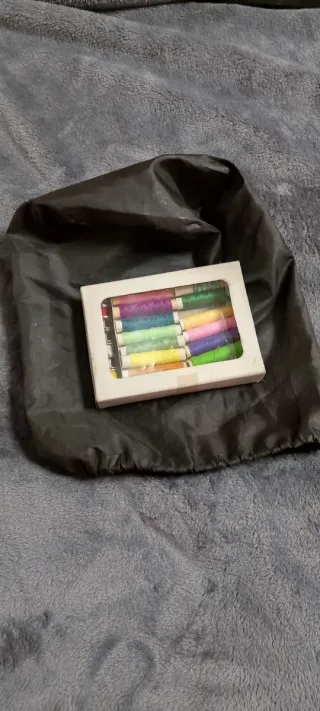 Máquina de coser eléctrica pequeña