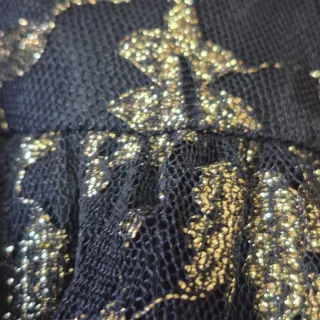 Gonna lunga nera con dettagli oro