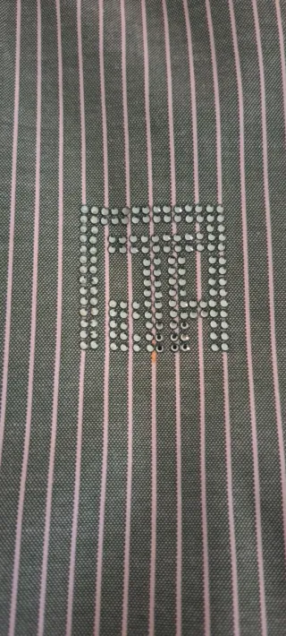 Camisa de rayas verde y blanca