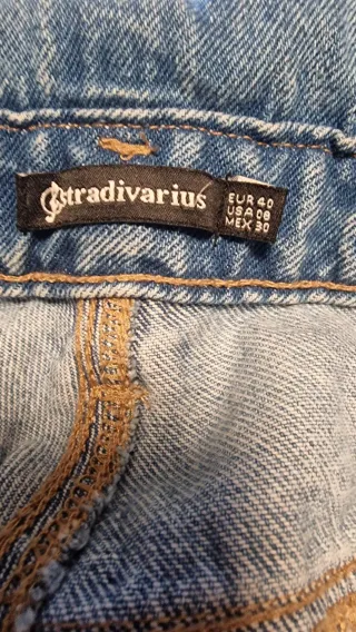 Peto tejano desgastado con texto