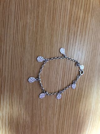 Pulsera de plata con mariquitas