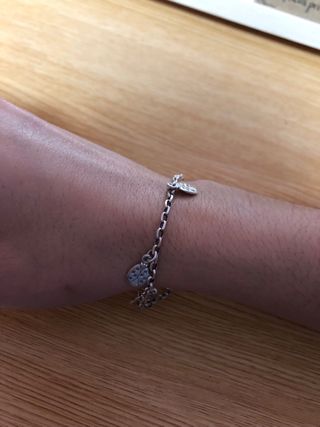 Pulsera de plata con mariquitas