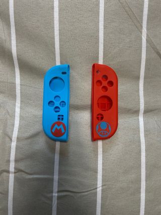 Mando Nintendo Switch + Fundas