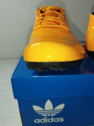 Zapatillas Atletismo Puma Naranja y Negro