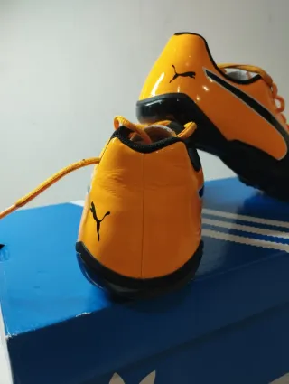 Zapatillas Atletismo Puma Naranja y Negro