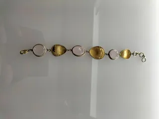 Bracciale con pietre rosa e oro