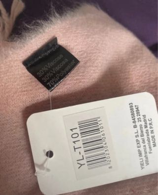 Bufanda rosa con flecos