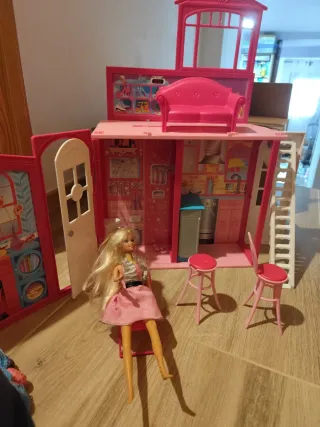Casa valigetta, cavallo Barbie, moto grande Barbie