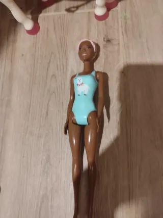 Casa valigetta, cavallo Barbie, moto grande Barbie