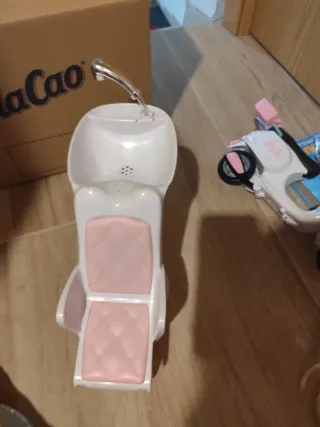 Casa valigetta, cavallo Barbie, moto grande Barbie